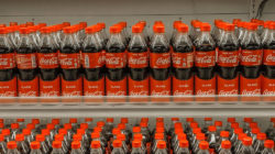  Many Coca-Cola bottles in shelf
