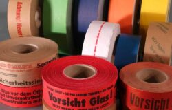 Brightly coloured rolls of printed adhesive tape